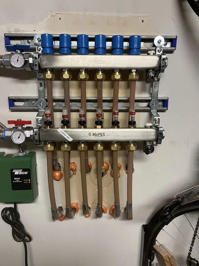 Plumber performing Leak Detection at a residential property in Hampstead